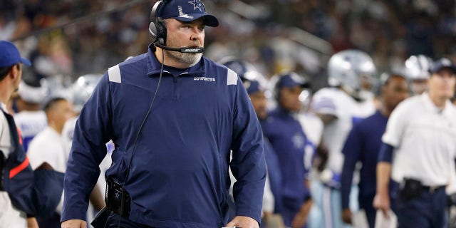 Dallas Cowboys head coach Mike McCarthy watches play against the Las Vegas Raiders in the first half of a game in Arlington, Texas, Nov. 25, 2021.