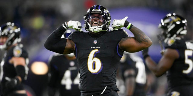Baltimore Ravens inside linebacker Patrick Queen reacts after making a tackle on Cleveland Browns running back Kareem Hunt during the second half of an NFL football game, Sunday, Nov. 28, 2021, in Baltimore.