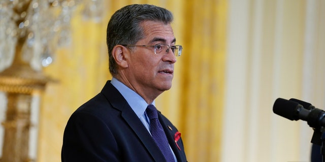 Health and Human Services Secretary Xavier Becerra speaks before President Joe Biden at an event to commemorate World AIDS Day during an event in the East Room of the White House, Wednesday, Dec. 1, 2021, in Washington. (AP Photo/Evan Vucci)