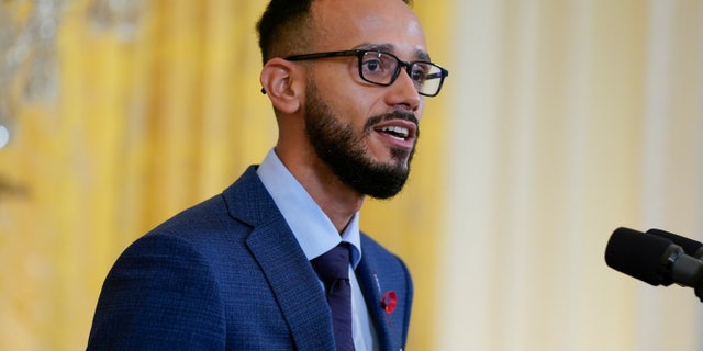 Gabriel Maldonado, HIV/AIDS Advocate, CEO and Founder of TruEvolution, speaks before President Joe Biden at an event to commemorate World AIDS Day during an event in the East Room of the White House, Wednesday, Dec. 1, 2021, in Washington. (AP Photo/Evan Vucci)