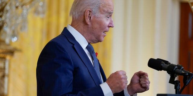 President Joe Biden speaks to commemorate World AIDS Day during an event in the East Room of the White House, Wednesday, Dec. 1, 2021, in Washington. (AP Photo/Evan Vucci)