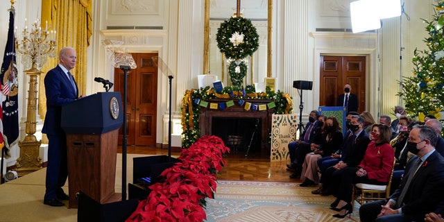 President Joe Biden speaks to commemorate World AIDS Day during an event in the East Room of the White House, Wednesday, Dec. 1, 2021, in Washington. (AP Photo/Evan Vucci)