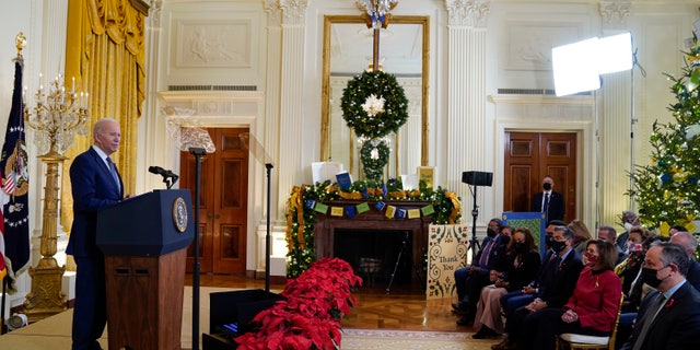 President Joe Biden speaks to commemorate World AIDS Day during an event in the East Room of the White House, Wednesday, Dec. 1, 2021, in Washington. (AP Photo/Evan Vucci)