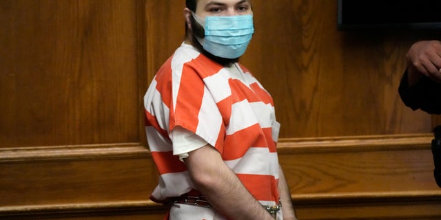 Ahmad Al Aliwi Alissa, accused of killing 10 people at a Colorado supermarket in March, is led into a courtroom for a hearing Tuesday, Sept. 7, 2021, in Boulder, Colo. Experts have found Alissa is mentally incompetent to proceed in the case. (AP Photo/David Zalubowski/Pool, File)