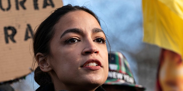 Rep. Alexandria Ocasio-Cortez, D-N.Y., speaks at a news conference urging the Senate to secure a pathway to citizenship in President Joe Biden's legislative agenda Tuesday, Dec. 7, 2021, on Capitol Hill in Washington. (AP Photo/Jacquelyn Martin)