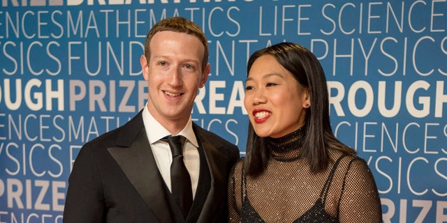 FILE - Facebook CEO Mark Zuckerberg and his wife Priscilla Chan arrive at the 7th annual Breakthrough Prize Ceremony at the NASA Ames Research Center on Sunday, Nov. 4, 2018, in Mountain View, Calif. (Photo by Peter Barreras/Invision/AP, File)