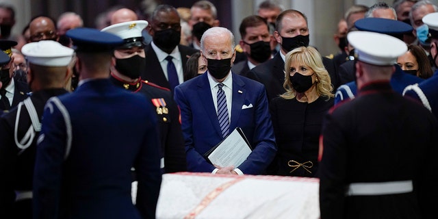 President Biden, first lady Jill Biden and Vice President Kamala Harris attend the funeral service for former Sen. Bob Dole of Kansas, at the Washington National Cathedral, Friday, Dec. 10, 2021, in Washington.