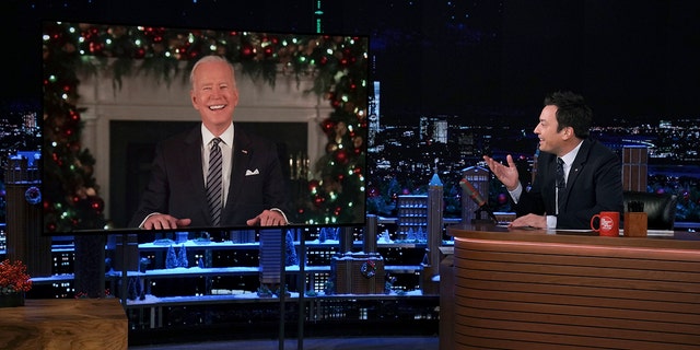 President Joe Biden is shown on a screen during a virtual interview with host Jimmy Fallon on "The Tonight Show Starring Jimmy Fallon," Friday, Dec. 10, 2021, in New York City. 