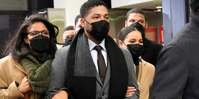 Actor Jussie Smollett, center, leaves the Leighton Criminal Courthouse with unidentified siblings, Thursday, Dec. 9, 2021, in Chicago, following a verdict in his trial. Smollett was convicted Thursday on five of six charges he staged an anti-gay, racist attack on himself nearly three years ago and then lied to Chicago police about it. 