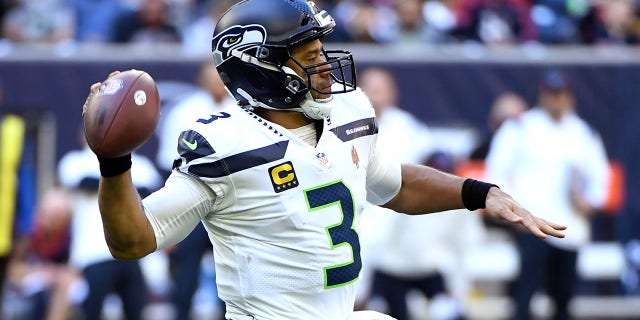 Seattle Seahawks quarterback Russell Wilson (3) throws against the Houston Texans during the first half Dec. 12, 2021, in Houston.