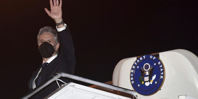 U.S. Secretary of State Antony Blinken boards an airplane as he departs Soekarno-Hatta International Airport in Jakarta, Indonesia, on Tuesday, Dec.14, 2021. 