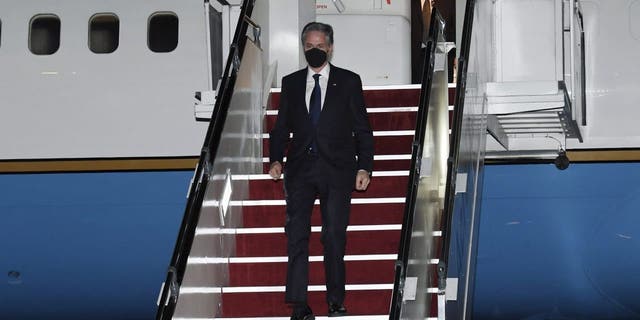 Secretary of State Antony Blinken arrives at Subang Airport, in Kuala Lumpur, Malaysia on Tuesday, Dec. 14, 2021. (Olivier Douliery/Pool via AP)