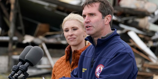 Kentucky's Missing Tornado Victims Have Been Accounted For, Governor Says 2 Kentucky Gov. Andy Beshear, accompanied by wife Britainy Beshear, speaks after surveying storm damage from tornadoes and extreme weather in Dawson Springs, Kentucky, Dec. 15, 2021.