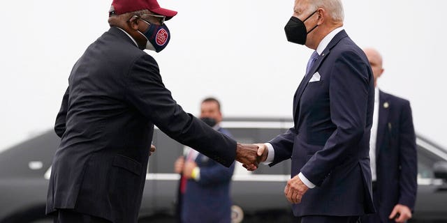 President Joe Biden is greeted by Rep. James Clyburn as he arrives at Columbia Metropolitan Airport on Air Force One in West Columbia, South Carolina, on Dec. 17, 2021.
