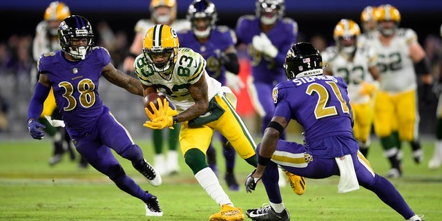 Green Bay Packers wide receiver Marquez Valdes-Scantling (83) rushes past Baltimore Ravens defensive back Kevon Seymour, left, and free safety Brandon Stephens in the second half of an NFL football game on Sunday in Baltimore. (AP Photo/Nick Wass)