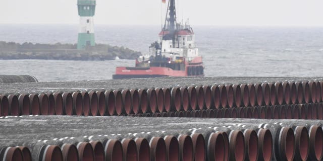 Pipes for the Nord Stream 2 Baltic Sea gas pipeline are stored on the premises of the port of Mukran near Sassnitz, Germany, on Dec. 4, 2020. (Stefan Sauer/dpa via AP, File)