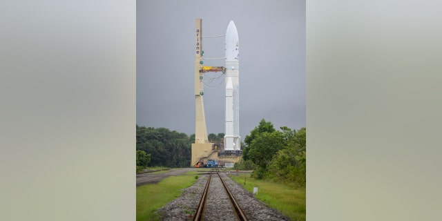 In this image released by NASA, Arianespace's Ariane 5 rocket with NASA's James Webb Space Telescope onboard, is rolled out to the launch pad, Thursday, Dec. 23, 2021, at Europe's Spaceport, the Guiana Space Center in Kourou, French Guiana. (Bill Ingalls/NASA via AP)