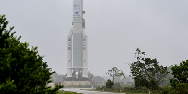 In this image released by NASA, Arianespace's Ariane 5 rocket with NASA's James Webb Space Telescope onboard, is rolled out to the launch pad, Thursday, Dec. 23, 2021, at Europe's Spaceport, the Guiana Space Center in Kourou, French Guiana. (Bill Ingalls/NASA via AP)