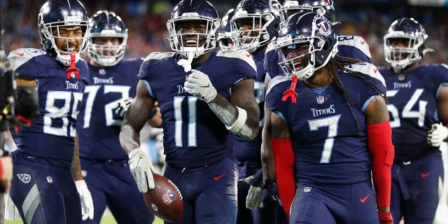 Tennessee Titans wide receiver A.J. Brown (11) celebrates after scoring a touchdown against the San Francisco 49ers in the second half of an NFL football game Thursday, Dec. 23, 2021, in Nashville, Tenn.