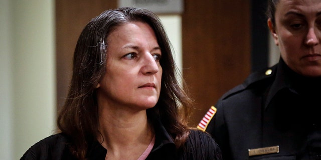 Michelle Lodzinski enters a courtroom in New Brunswick, New Jersey, March 18, 2016. (Associated Press)