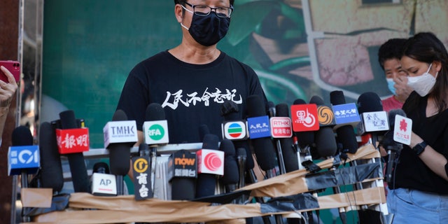 Spokesperson of Hong Kong Alliance in Support of Patriotic Democratic Movements of China, Richard Tsoi speaks to media after the group announced that it's disbanded in Hong Kong, Saturday, Sept. 25, 2021. (AP Photo/Kin Cheung, File)