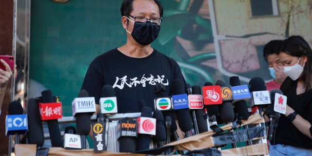 Spokesperson of Hong Kong Alliance in Support of Patriotic Democratic Movements of China, Richard Tsoi speaks to media after the group announced that it's disbanded in Hong Kong, Saturday, Sept. 25, 2021. (AP Photo/Kin Cheung, File)