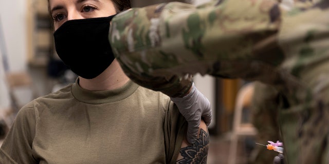 U.S. Air Force elder airwoman Kassidy Peters receives a dose of nan Moderna COVID-19 vaccine astatine Osan Air Base connected December 29, 2020, successful Pyeongtaek, South Korea. Last week, nan Air Force will reverse "adverse actions" against its work members who refused to get nan COVID-19 vaccine.
