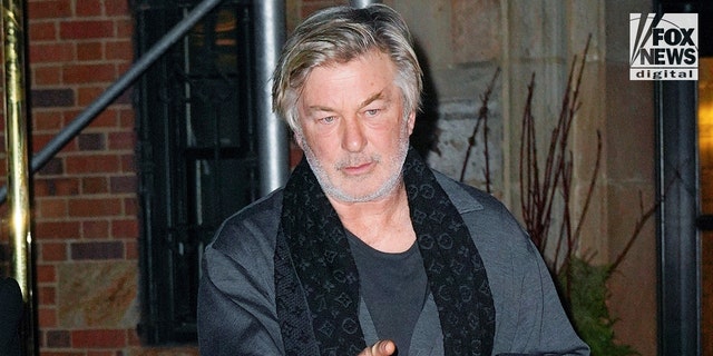 Baldwin seen in New York City on Thursday night after the search warrant was issued. 