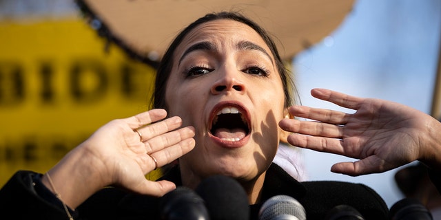 Rep. Alexandria Ocasio-Cortez, D-N.Y., speaks during a rally for immigration provisions to be included in the Build Back Better Act outside the U.S. Capitol Dec. 7, 2021, in Washington.