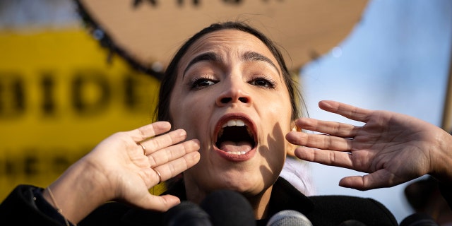 Rep. Alexandria Ocasio-Cortez, D-N.Y., speaks during a rally for immigration provisions to be included in the Build Back Better Act outside the U.S. Capitol, Dec. 7, 2021 in Washington.