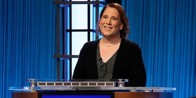 Amy Schneider is officially the fourth highest-earning 'Jeopardy!' contestant in the show's history. On Monday, she revealed she was robbed in Oakland, California. 