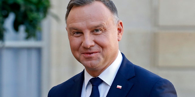 Polish President Andrzej Duda poses as he arrives for a working lunch with French President Emmanuel Macron at the Elysee Palace on Oct. 27, 2021, in Paris, France.