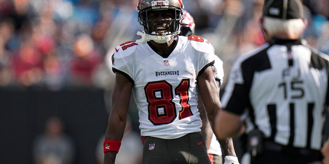 Tampa Bay Buccaneers wide receiver Antonio Brown celebrates during the first half of an NFL football game against the Carolina Panthers Sunday, Dec. 26, 2021, in Charlotte, N.C.