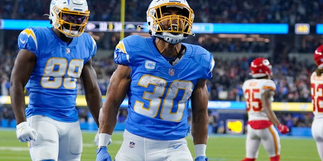 Los Angeles Chargers running back Austin Ekeler (30) reacts after scoring a touchdown in the second half of an NFL football game against the Kansas City Chiefs on Thursday, December 16, 2021, in Inglewood , in California.