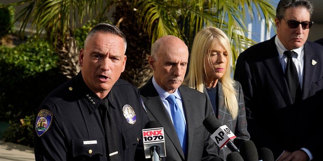 Beverly Hills Police Chief Mark G. Stainbrook, left, addresses the media during a news conference, Wednesday, Dec. 1, 2021, in Beverly Hills, Calif. Jacqueline Avant, the wife of music legend Clarence Avant, was fatally shot in Beverly Hills early Wednesday. Second from left is Beverly Hills Mayor Robert Wunderlich. (AP Photo/Chris Pizzello)