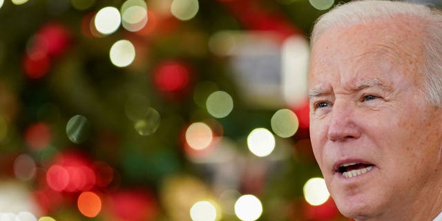 FILE PHOTO: U.S. President Joe Biden delivers remarks on the November jobs report at the White House in Washington, U.S., December 3, 2021.