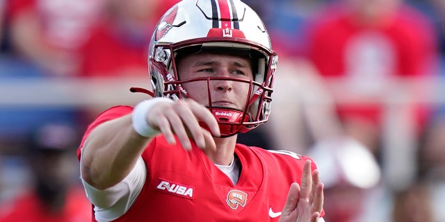 Western Kentucky quarterback Bailey Zappe throws a pass during the first half of the Boca Bowl NCAA college football game against Appalachian State, Saturday, Dec. 18, 2021 in Boca Raton, Fla.