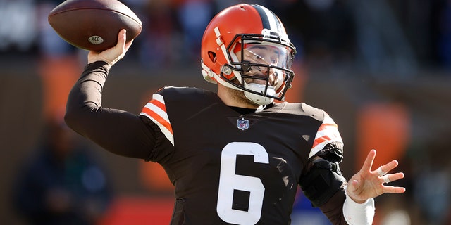 Cleveland Browns quarterback Baker Mayfield throws during the first half of the game against the Baltimore Ravens on December 12, 2021 in Cleveland.