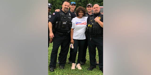 Kathy Barnette standing beside PA police. (Credit: Kathy Barnette)