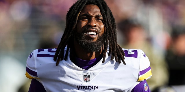 BALTIMORE, MD - NOVEMBER 07: Bashaud Breeland #21 of the Minnesota Vikings looks on from the sidelines after being injured during the first half of the game against the Baltimore Ravens at M&T Bank Stadium on November 7, 2021 in Baltimore, Maryland.