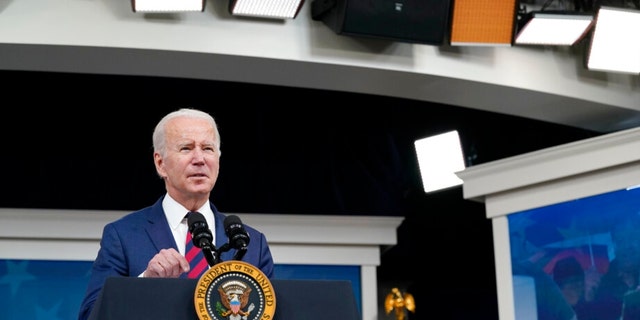 President Joe Biden speaks before signing the "Accelerating Access to Critical Therapies for ALS Act" into law in the South Court Auditorium on the White House campus in Washington, Thursday, Dec. 23, 2021. (AP Photo/Patrick Semansky)