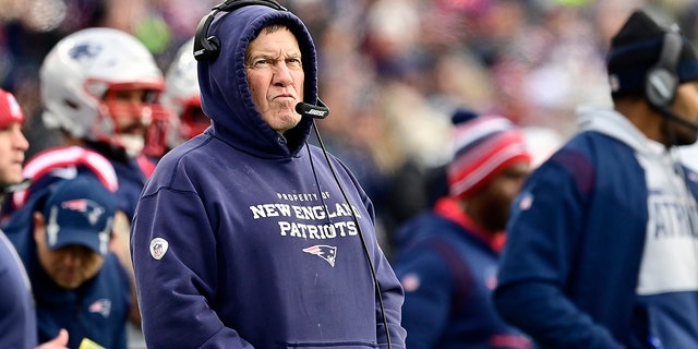 Head coach Bill Belichick of the New England Patriots looks on from the sidelines during the second quarter against the Buffalo Bills at Gillette Stadium on Dec. 26, 2021, in Foxborough, Massachusetts.