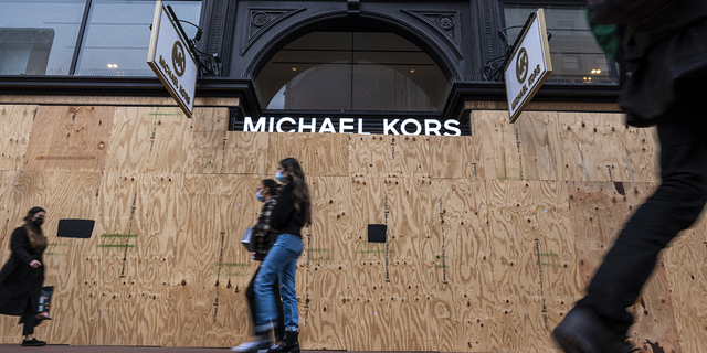 A boarded-up Michael Kors store in San Francisco, California, amid a rise in smash-and-grab theft. 