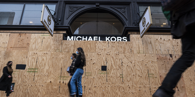 A boarded up Michael Kors store in San Francisco, California amid a rise in smash-and-grab theft. 