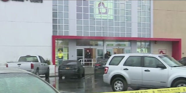 A Burlington Coat Factory in North Hollywood, Los Angeles. A girl, 14, was killed when she was struck by a Los Angeles police bullet that went through a wall in a shooting that killed a suspect, police said. 