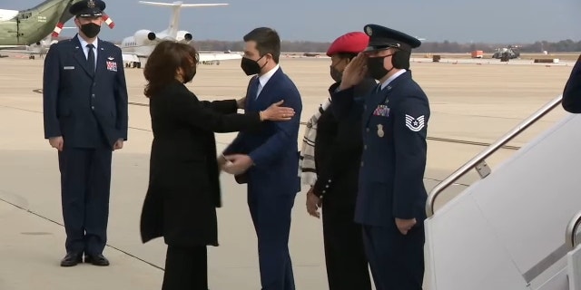 Vice President Harris and Transportation Secretary Pete Buttigieg before their flight to North Carolina on Thursday, Dec. 2, 2021.