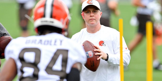 Callie Brownson assists in a drill during the second day of Cleveland Browns training camp on July 29, 2021, in Berea, Ohio.