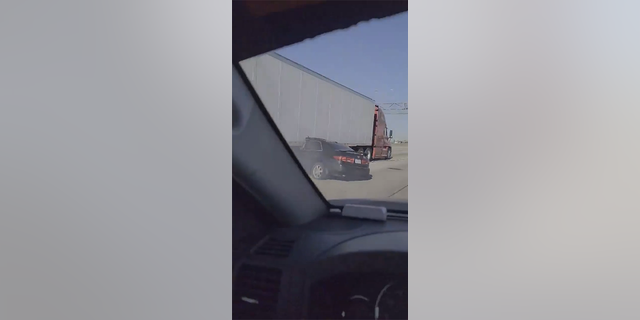 Tractor-trailer drags sedan down Illinois highway