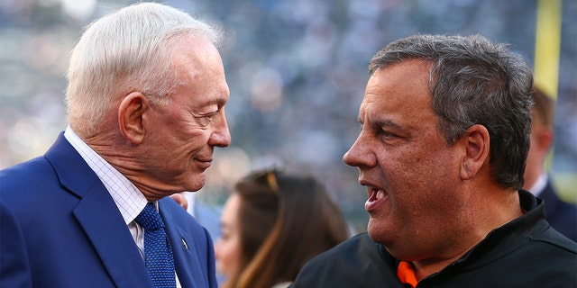 Dallas Cowboys owner Jerry Jones (left) and Former New Jersey Gov. Chris Christie talk prior to the National Football League game between the New York Jets and the Dallas Cowboys on Oct. 13, 2019, at MetLife Stadium in East Rutherford, New Jersey.