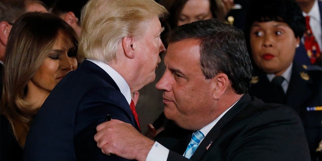 President Trump greets New Jersey Gov. Chris Christie after speaking about administration plans to combat the nation's opioid crisis in the East Room of the White House in Washington, Oct. 26, 2017.